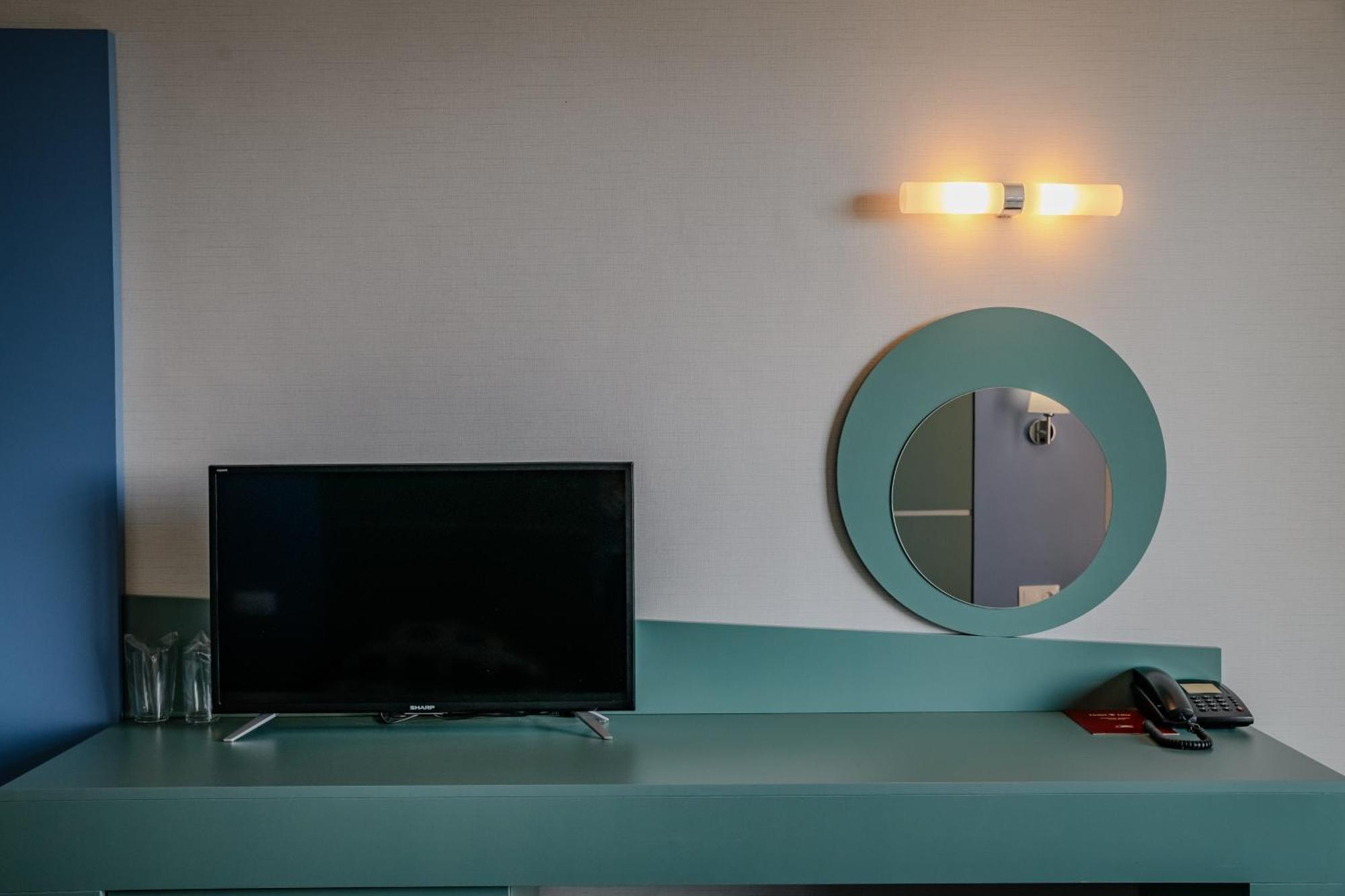 Standard Doppel- oder Zweibettzimmer (2 Erwachsene + 1 Kind)