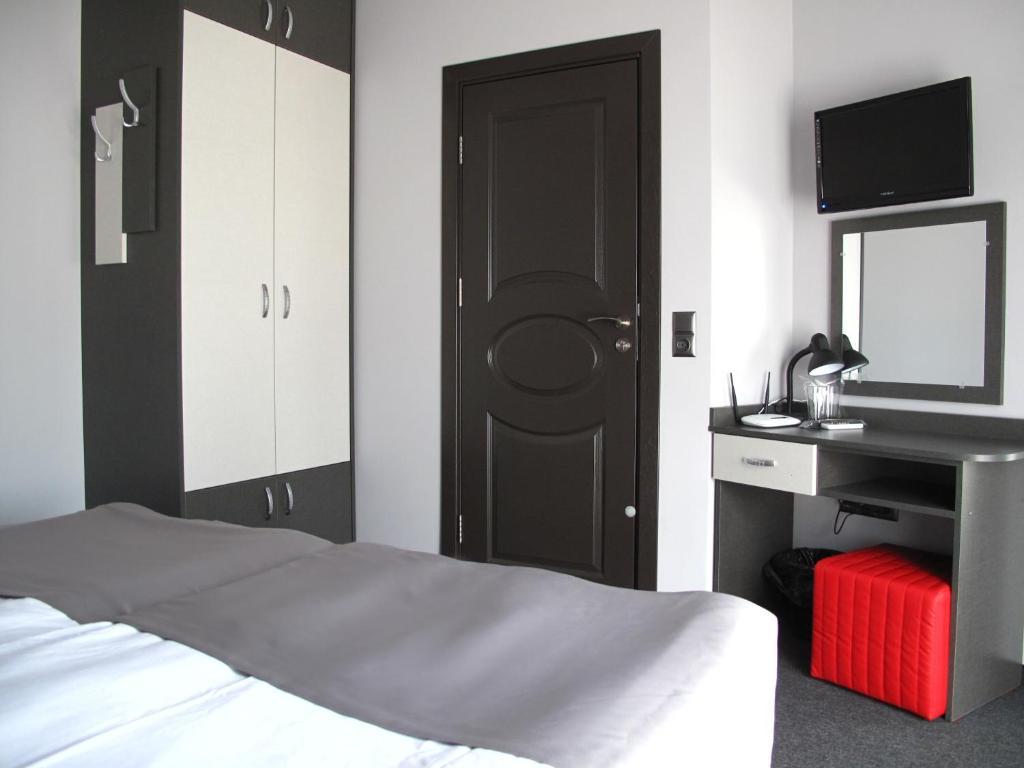 Doppel- oder Zweibettzimmer